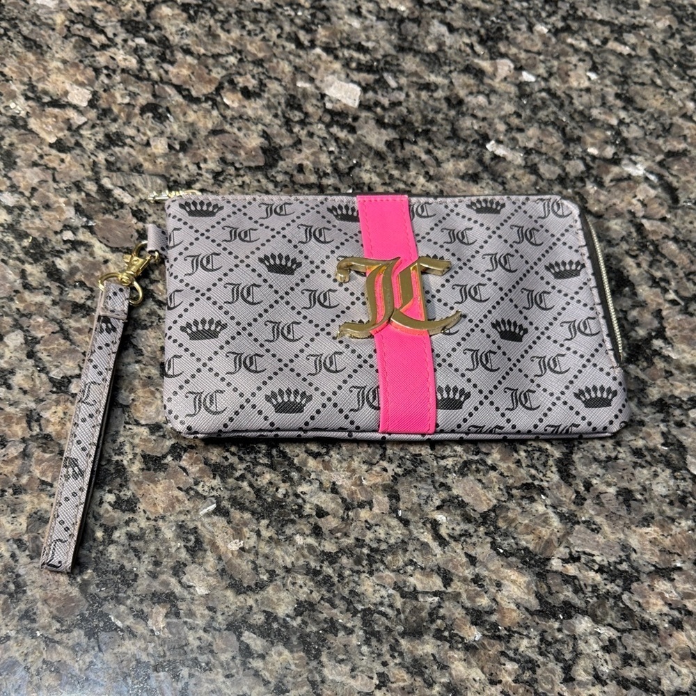 Juicy Couture Gray charging Wristlet with Pink Accent